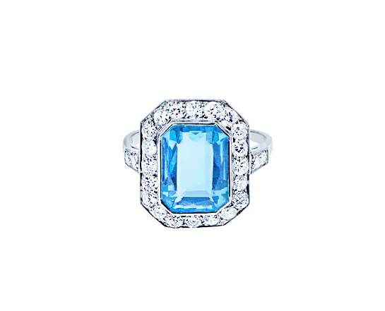 Platinum ring with blue topaz and diamonds