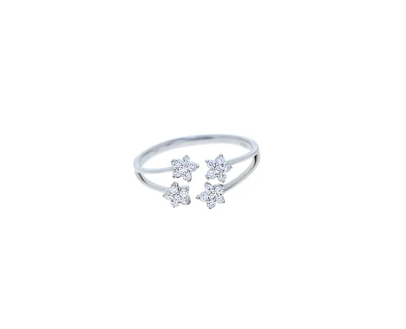 White gold ring with four diamond flowers